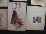 many pictures of women in dresses on the wall