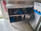 a small kitchen with a stove and a sink