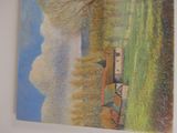 a picture of a painting hanging on the wall