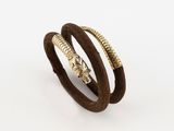 a close up of three bracelets on a white background