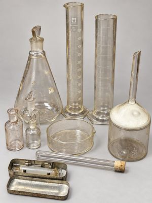 a lot of glass items that are sitting on a table