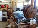 a room filled with lots of different types of furniture