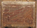 an old piece of wood with a painting on it