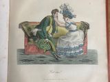an open book with a drawing of a man and a woman sitting on a couch