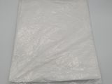 a bag of white tissue sitting on top of a table