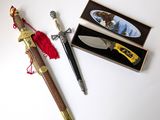 a knife and a box with a picture of a bird on it