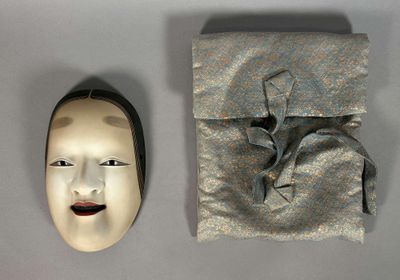 a mask and a mask bag on a table
