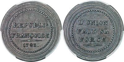 gros plan d'une pièce de monnaie sur une surface blanche