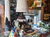a glass table that has a lot of items on it