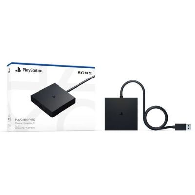 a box with a cable connected to it next to a box