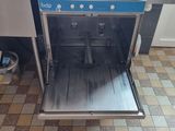 an image of a kitchen with a sink and a dishwasher