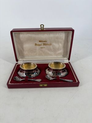 pair of silver plated bowls and spoons in a red case