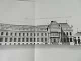 an open book with a drawing of a building on it