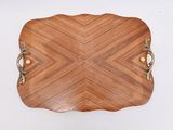 an image of a wooden tray with handles on a white wall