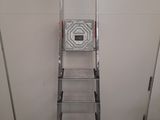 a ladder that is leaning up against the wall