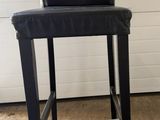 black leather bar stool with back cushion