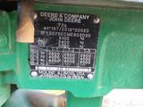a close up of a green machine with a label on it