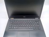 a laptop computer that is sitting on a table