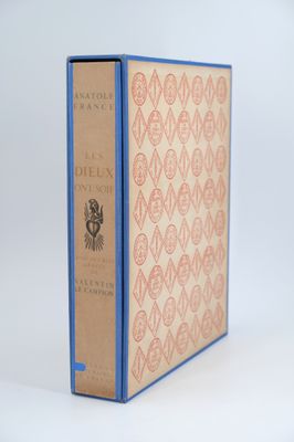 a book with a blue cover sitting on top of a white table