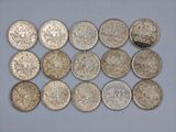 a close up of a bunch of coins on a table