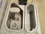 a toilet that has two toilets inside of it