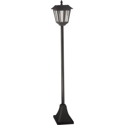 a black lamp post with a light on top of it