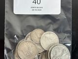 a lot of coins in a bag on the table