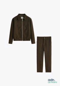 an image of a brown jacket and pants