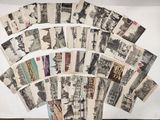 un lot de vieilles cartes postales posées sur une table