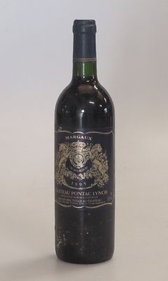 a bottle of wine that is sitting on a table