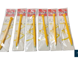 six yellow toothbrushes in a package on a white background