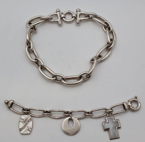 Parure en argent comprenant un collier chaîne et un bracelet à dé...