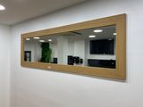 a large mirror on the wall in the room
