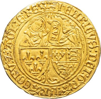 a gold coin with an image of a man on a horse