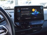 the dashboard of a car with a digital display in the center