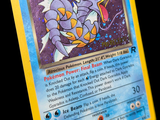 a pokemon card with a picture of a dragon on it
