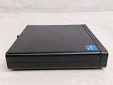 an image of a black dvd player sitting on a white surface