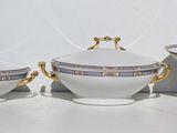 three bowls and a bowl sitting on a table