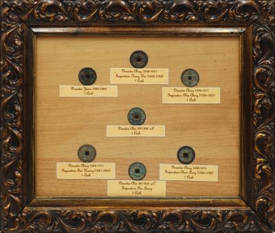 an old picture of a picture of a family tree in a frame