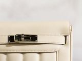an image of a white purse with a lock on it