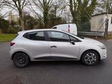 a silver car parked on the side of the road