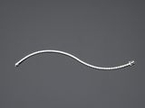 une image représentant un bracelet en argent orné d'un serpent
