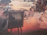 a painting of a man sitting in front of a painting easel