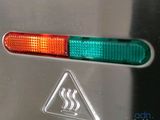 an image of a close up of a red and green light
