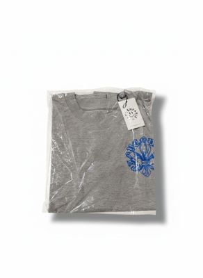 a t - shirt with a blue flower on the front of it