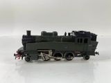 a toy train on a white surface with a white background
