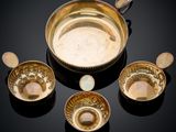 an image of a group of bowls and spoons sitting on a table