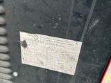 a close up of a piece of metal with a sticker on it