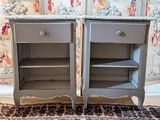 two nightstands that have been painted gray and are next to each other