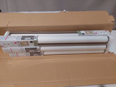 a box that has a roll of paper on top of it